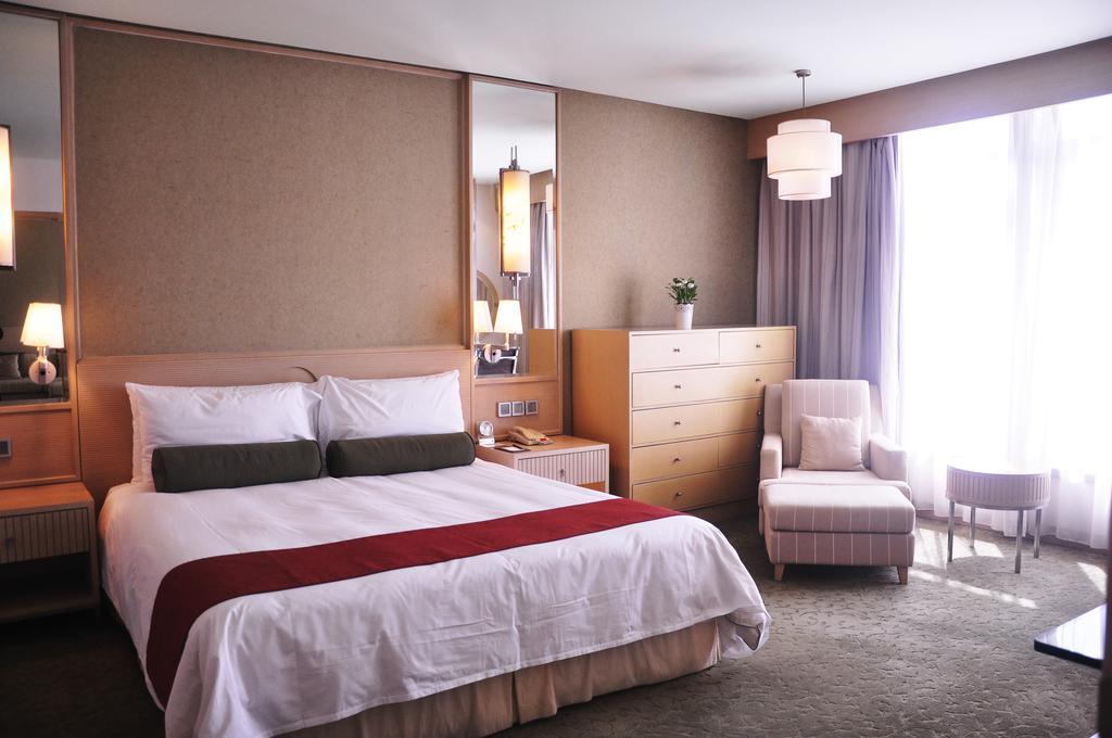 Hotel Nikko Tientsin Dış mekan fotoğraf A bedroom at the hotel